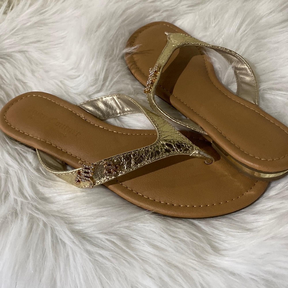 Juicy Couture Gold flip flop sandals
